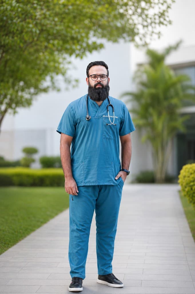 Dr. Usama Riyaz, founder of Zindagi Care, in medical scrubs